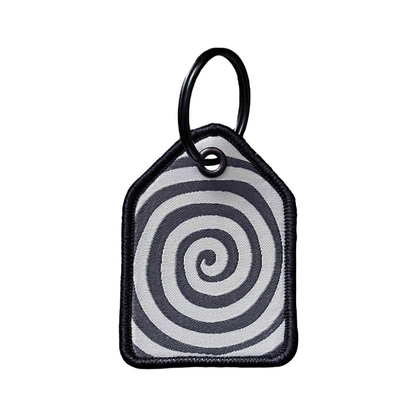 Brainwash Mini Keytag small keychain with a gray and white swirling pattern.