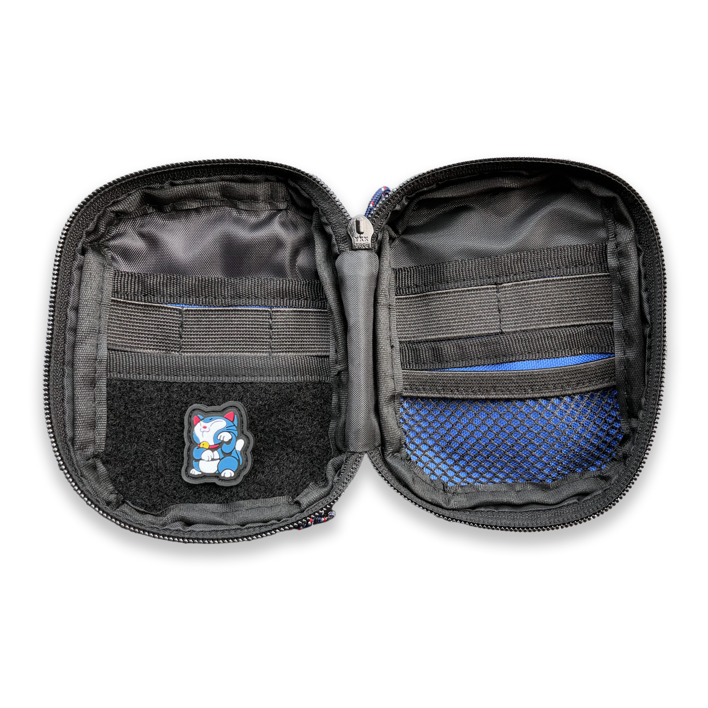 Companion 002 Pouch - Blue pocket organizer inside featuring organizer elastics, mesh, and soft velcro loop for patches. A Snorlax Neko patch is displayed on the left.