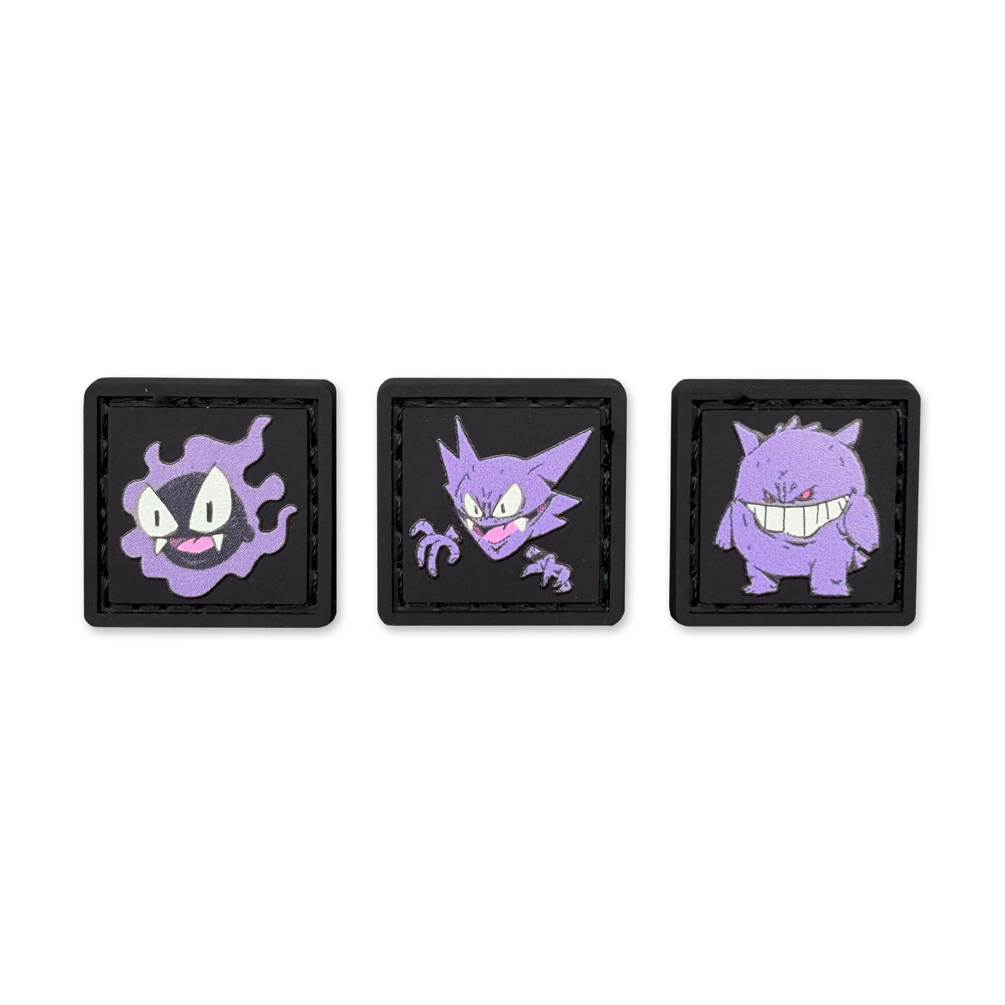 Three square patches with cartoon characters on a white background