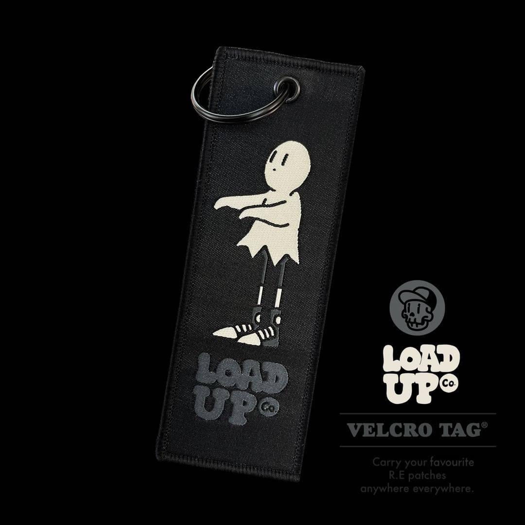 Ghost Guy Keytag black keytag with a ghost character and LOADUP text at the bottom with a black background.