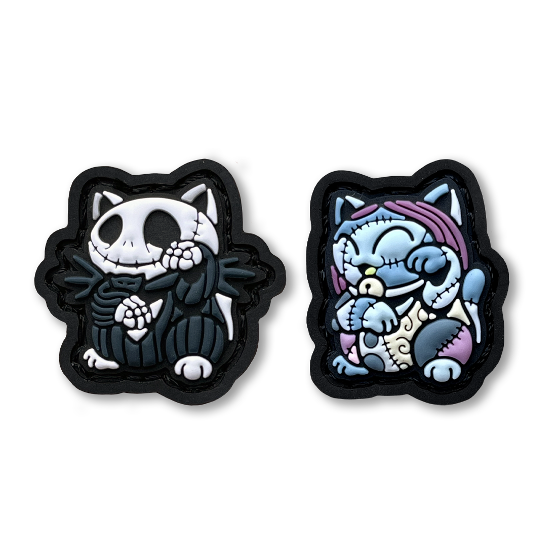 2 patches depicting jack skellington and sally in the lucky cat neko pose.