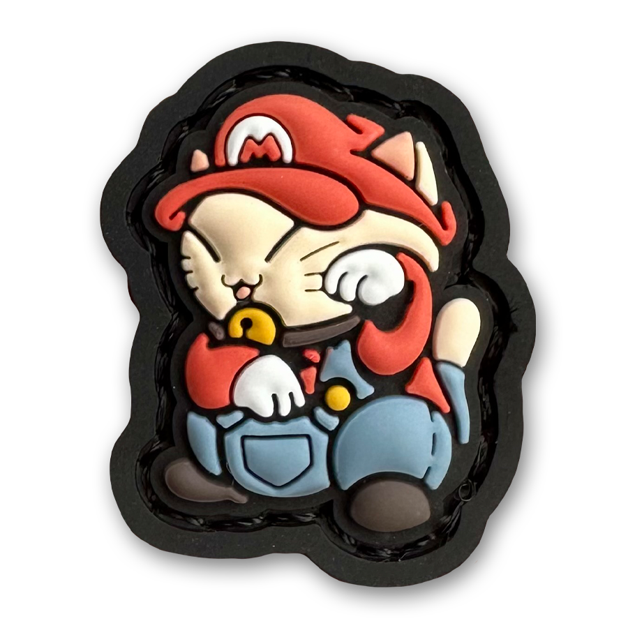 Mario Neko RE PVC ranger eye morale patch of a character wearing a red hat and overalls sitting in a lucky cat maneki-neko pose.