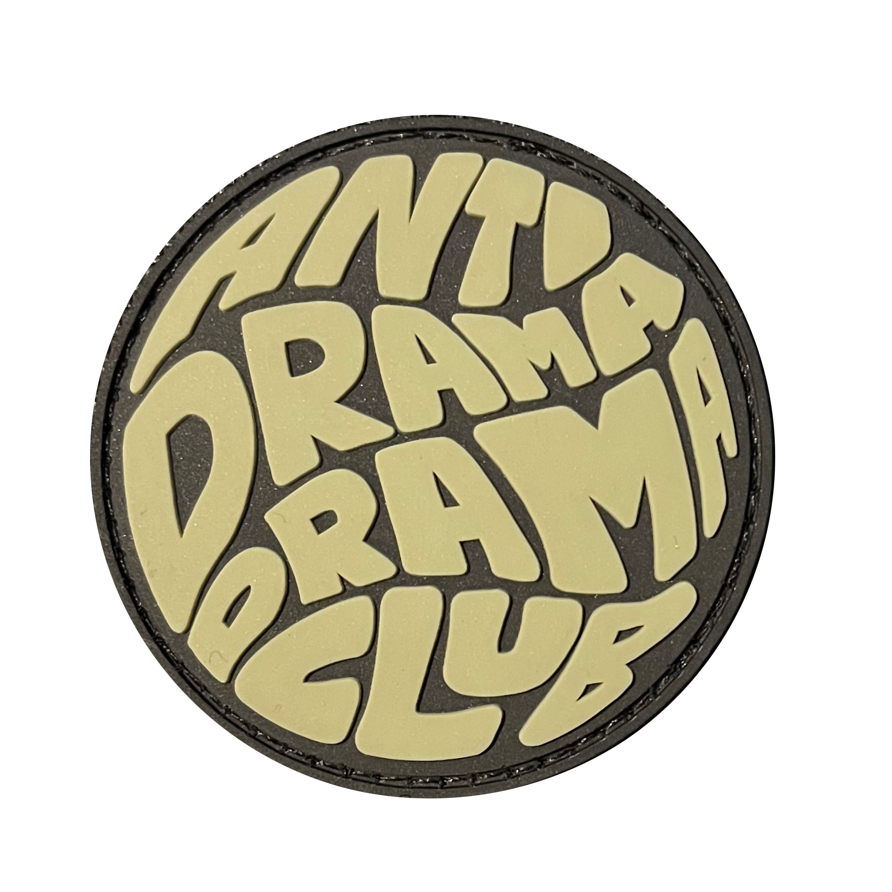 Anti Drama Drama Club RE PVC ranger eye morale patch - A circle round patch that says Anti Drama Drama Club. Primary color is green beige.