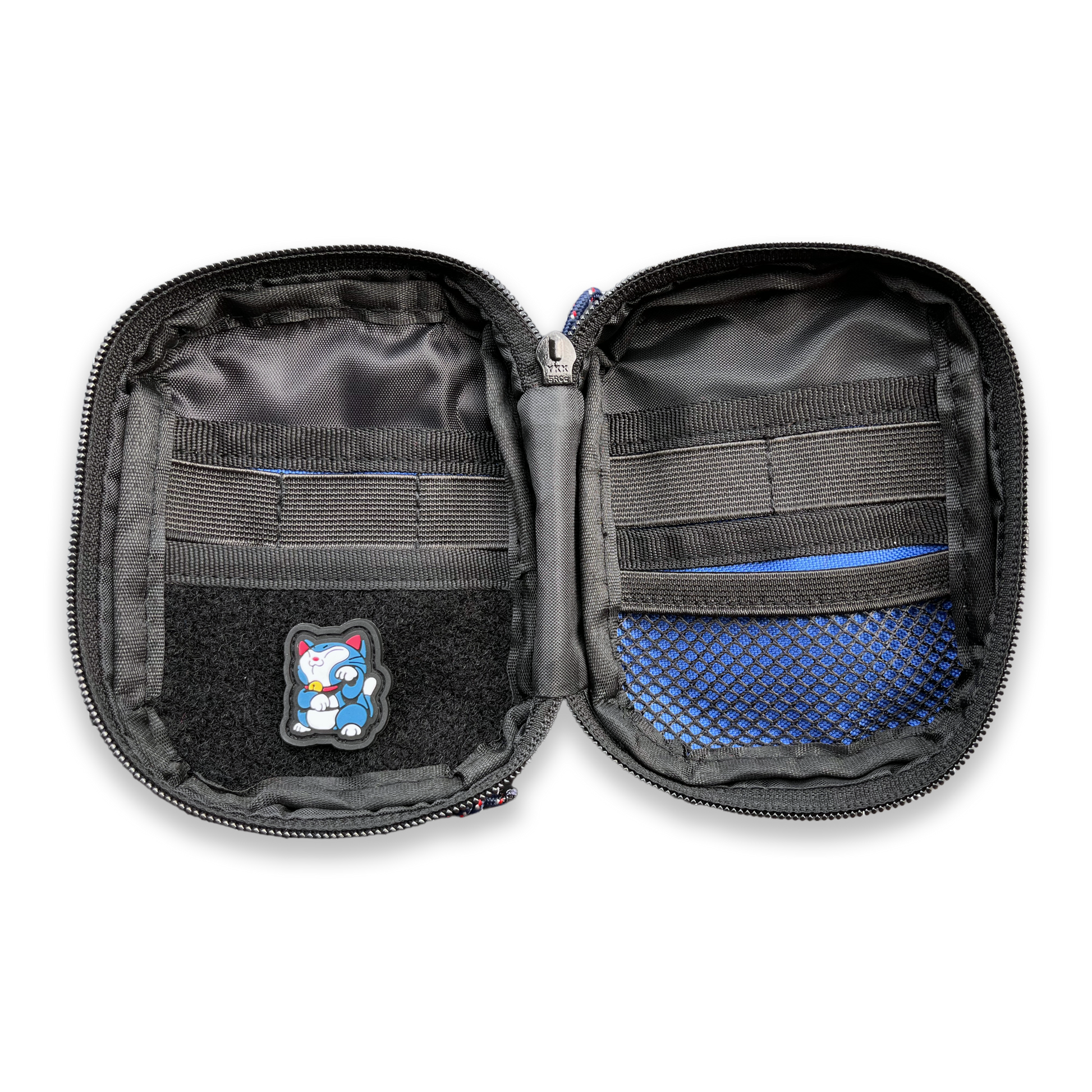Companion 002 Pouch - Blue pocket organizer inside featuring organizer elastics, mesh, and soft velcro loop for patches. A Snorlax Neko patch is displayed on the left.