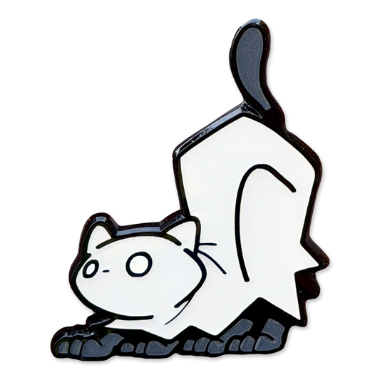 Enamel pin depicting a cat in a ghost outfit crouching.