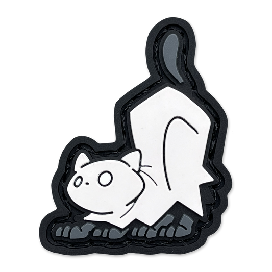Crouching Ghost Cat RE ranger eye patch of a crouching cartoon cat wearing a white ghost costume.