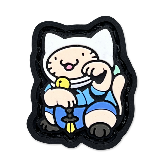 Finn Neko RE ranger eye patch with a cartoon cat character wearing a white hat and blue outfit in a lucky cat maneko pose.