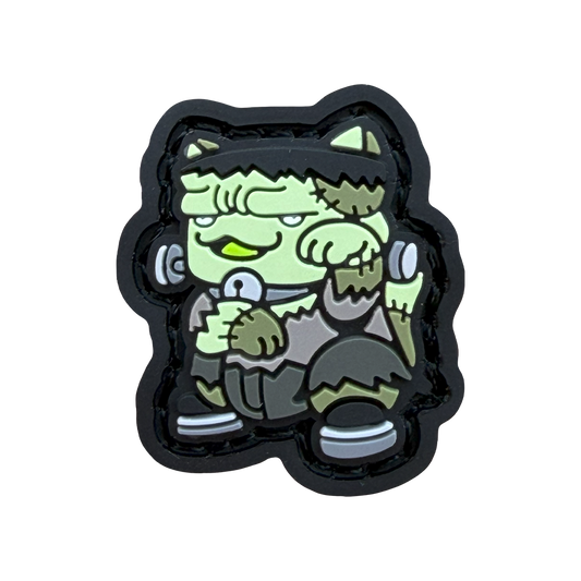 Frankenstein Neko RE patch with a green Frankenstein in a lucky cat neko pose.