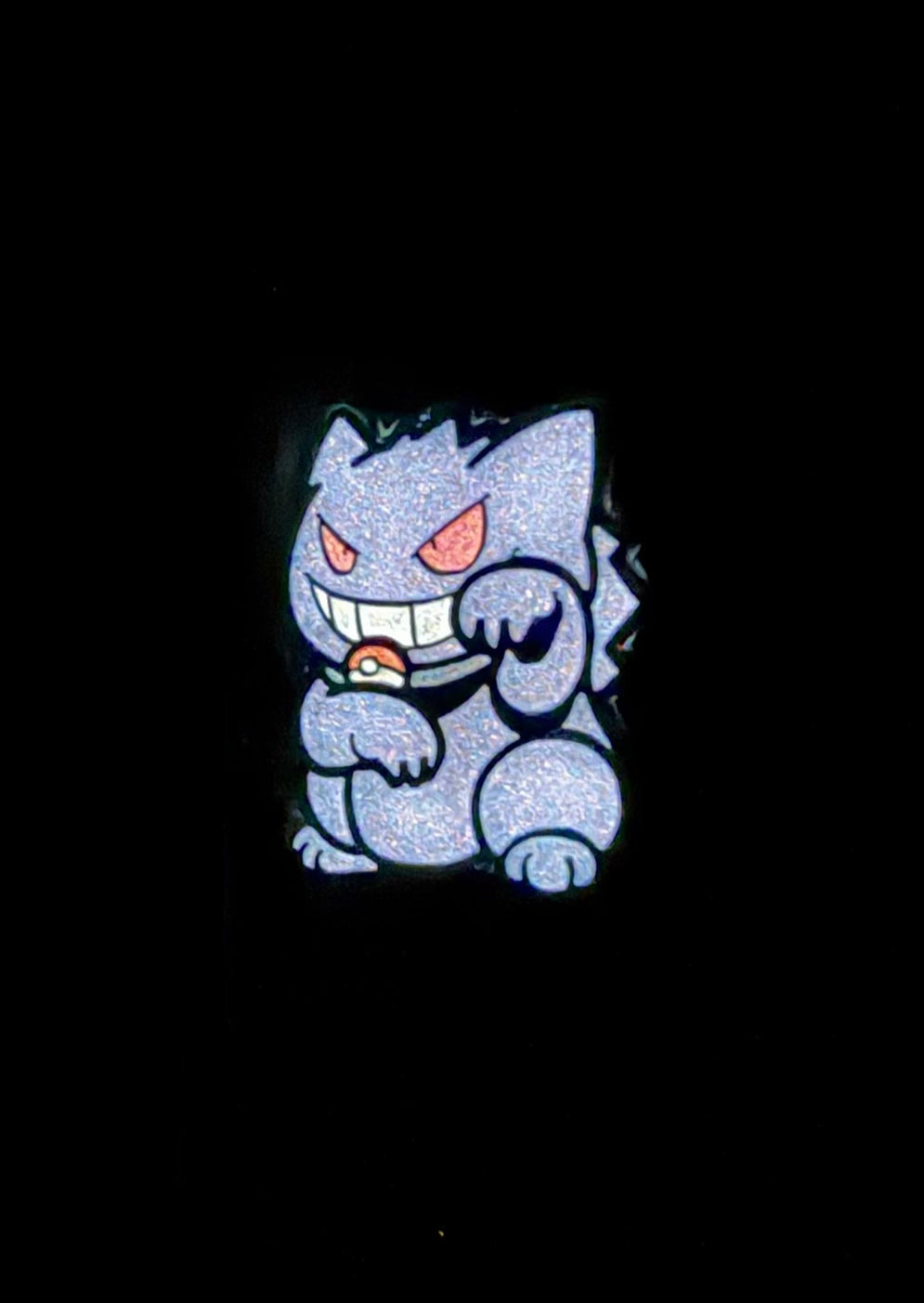 Glow in the dark Gengar Neko Pin Cartoon character with a purple body and red eyes.