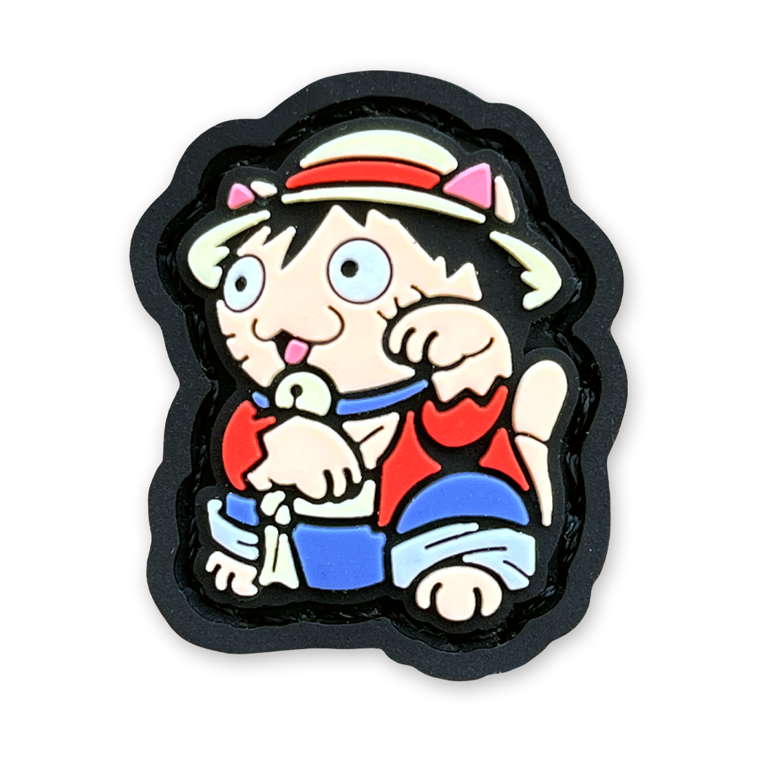Luffy Neko RE PVC ranger eye patch of a cartoon character wearing a red shirt and straw hat in a lucky cat maneko pose.