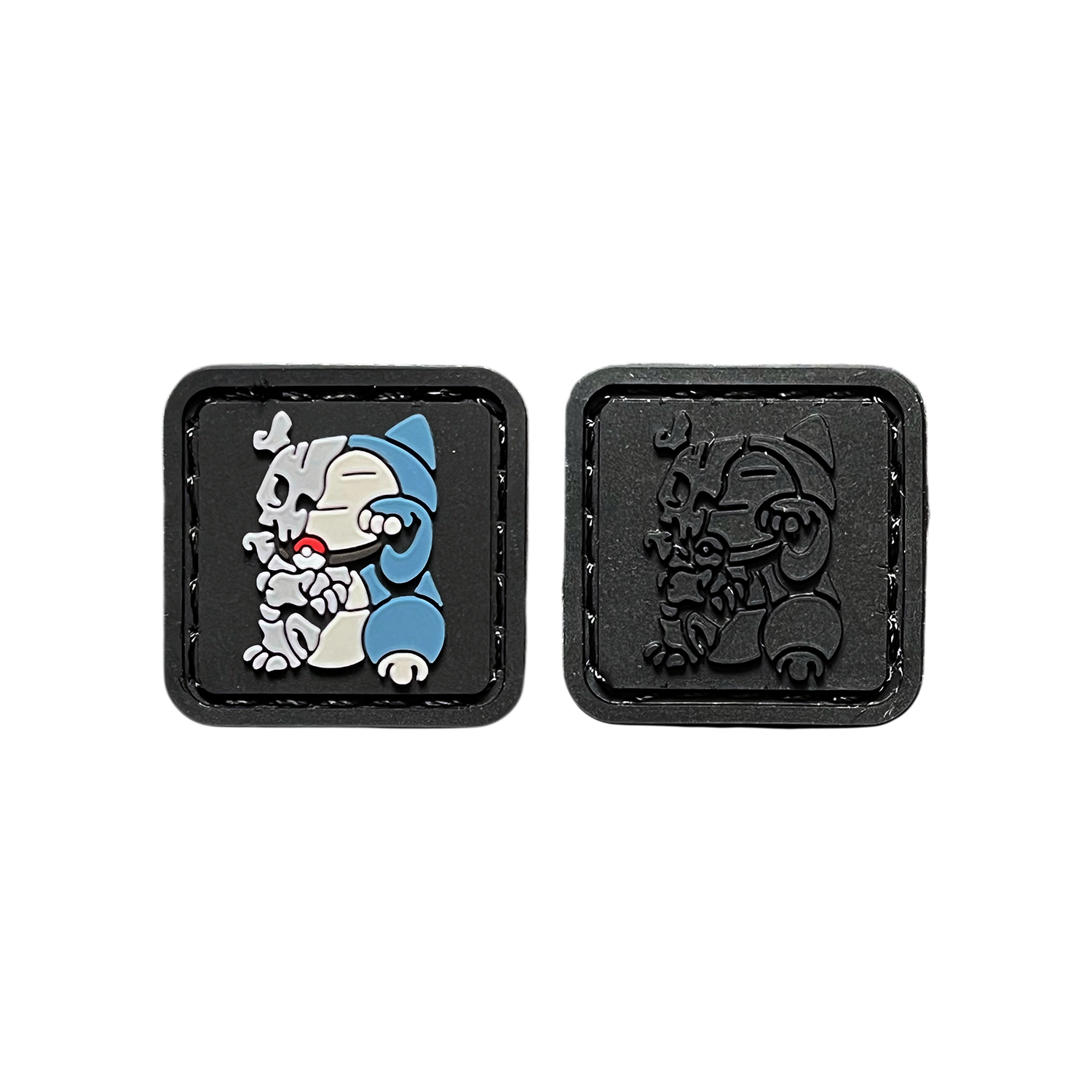 Myke Cruz x LOADUP Skull Neko RE Set PVC ranger eye morale patches of a green monster with bones sticking out sitting in a lucky cat maneki neko pose. The other patch is the same character but fully blacked out in color.