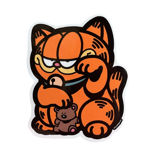 Neko 8 Sticker of an orange cat holding a teddy bear in a lucky cat maneki-neko pose.