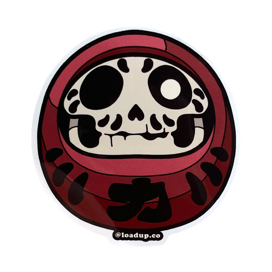 Skull Daruma Sticker of a red daruma doll.
