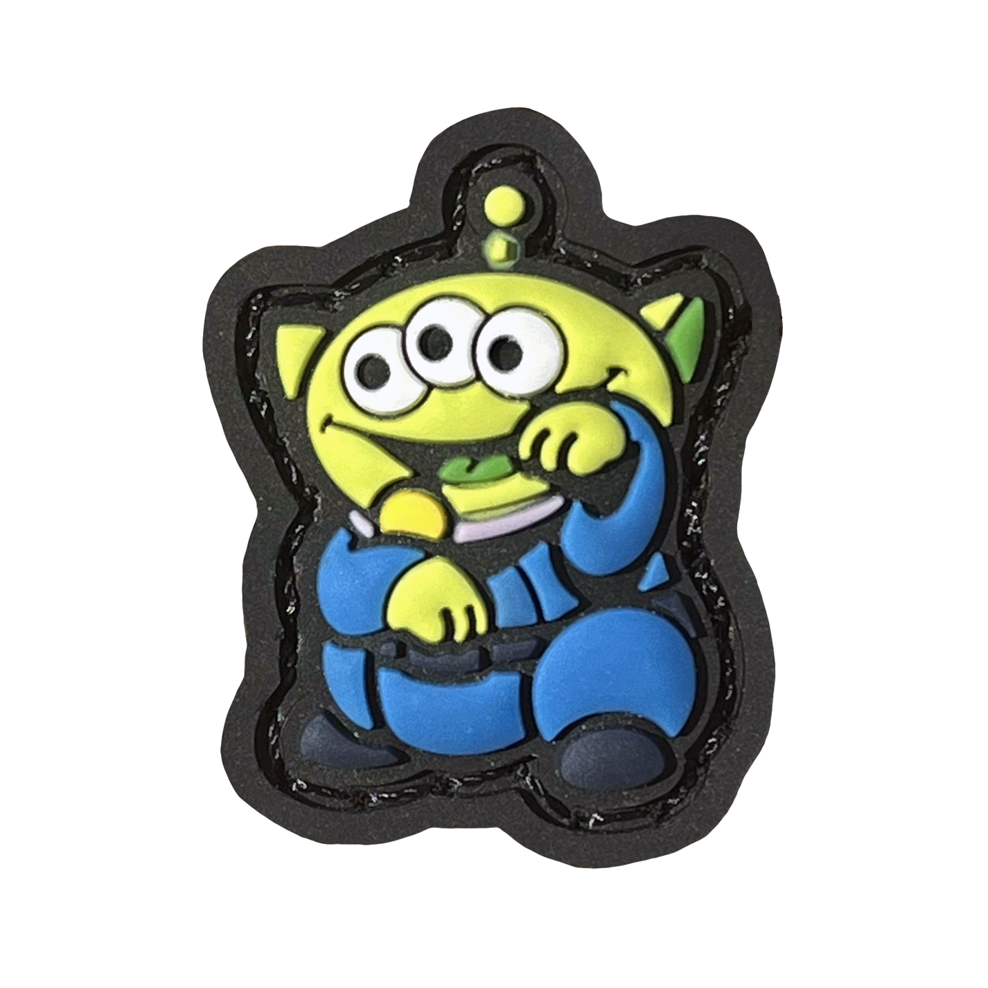 Alien Neko RE PVC ranger eye morale patch of a green alien with three eyes wearing a blue outfit sitting in a lucky cat maneki-neko pose.