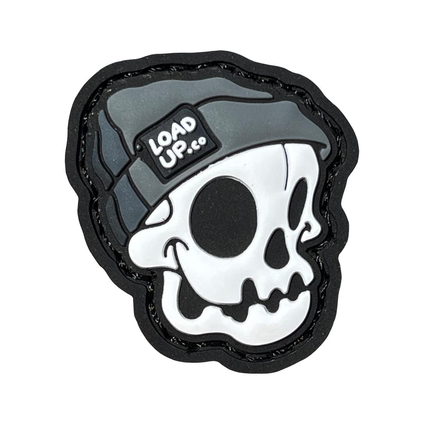 Beanie Skull RE PVC ranger eye morale patch of a skull head wearing a gray beanie with a LOADUP.co label.