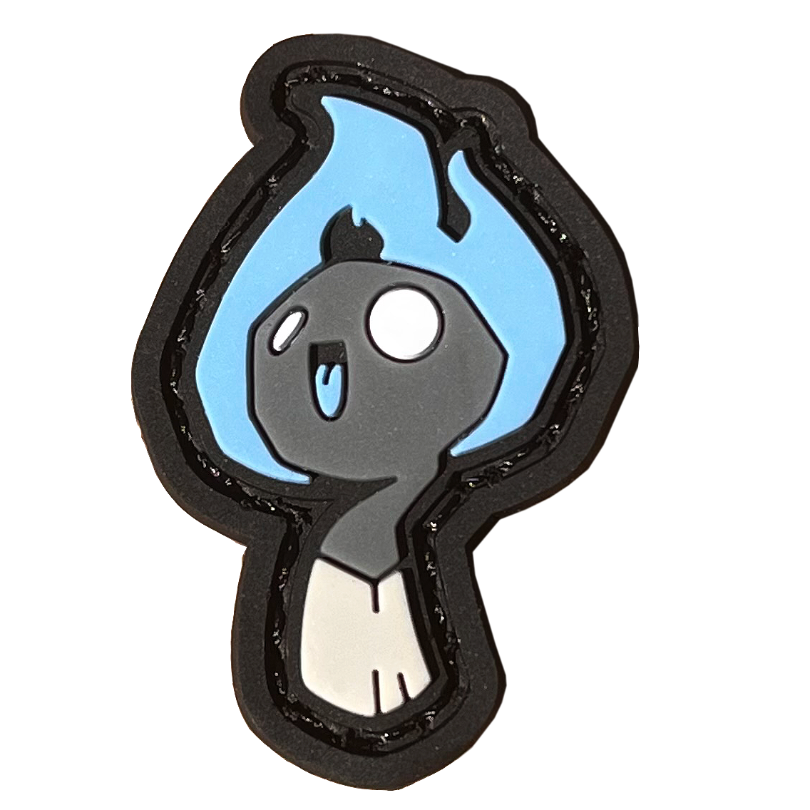  A smiling cartoon character resembling a lit match with a blue flame.