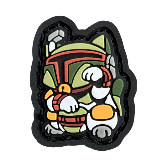 Boba Fett Neko RE 2D PVC ranger eye morale patch of a cartoon character wearing a green helmet and suit standing in a lucky cat maneko pose.