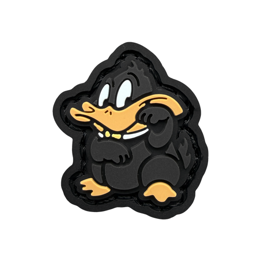 Duck Neko RE ranger eye PVC morale patch of a black duck sitting in a lucky cat maneki neko pose.