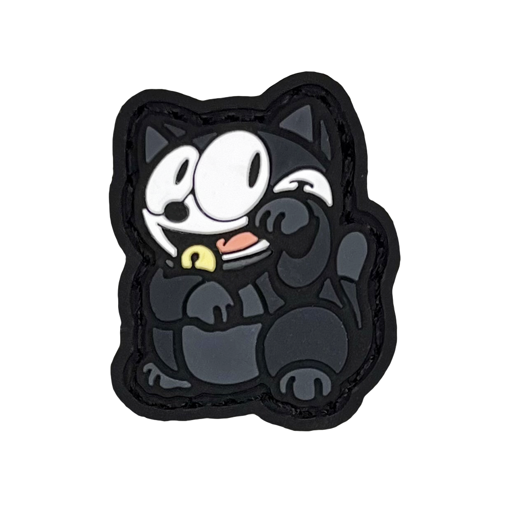 Felix Neko RE PVC ranger eye morale patch of a black cat sitting in a lucky cat maneki-neko pose.