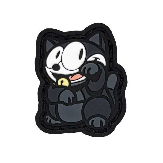 Felix Neko RE PVC ranger eye morale patch of a black cat sitting in a lucky cat maneki-neko pose.
