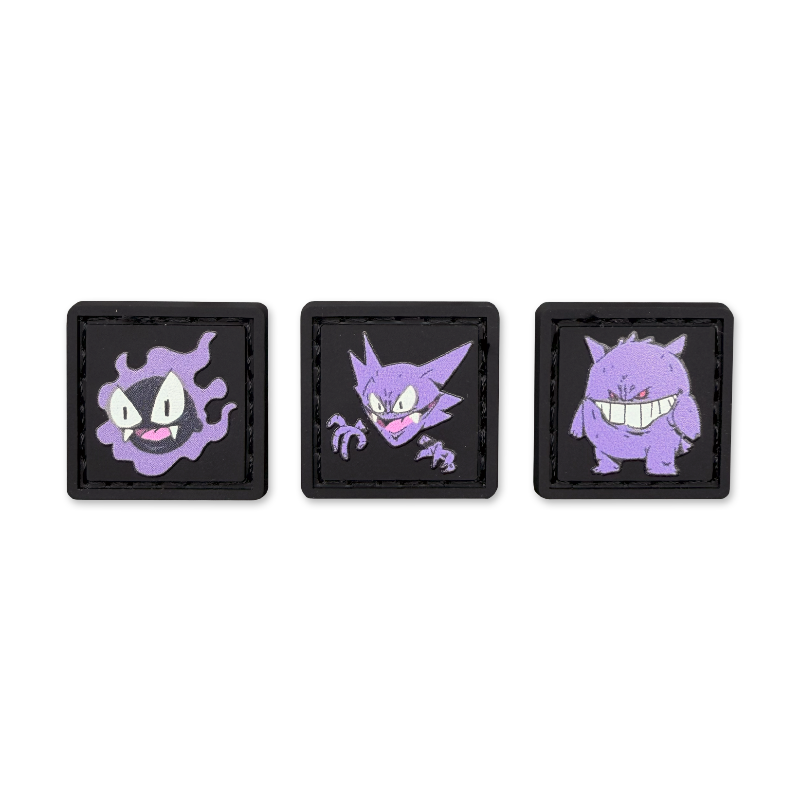 Three square patches with cartoon characters on a white background