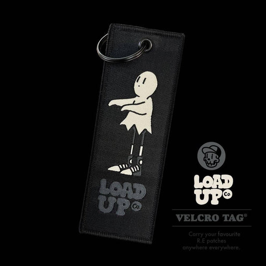 Ghost Guy Keytag black keytag with a ghost character and LOADUP text at the bottom with a black background.
