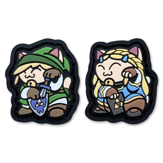 Hero & princess neko re set ranger eye pvc morale patch of a character holding a shield and sword and a girl character holding a book in a lucky cat maneki neko pose