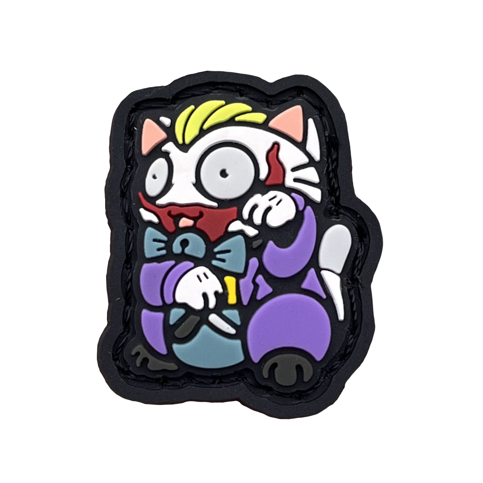 Joker Neko RE PVC ranger eye morale patch of a character wearing a purple suit holding a knife sitting in a lucky cat maneki-neko pose.