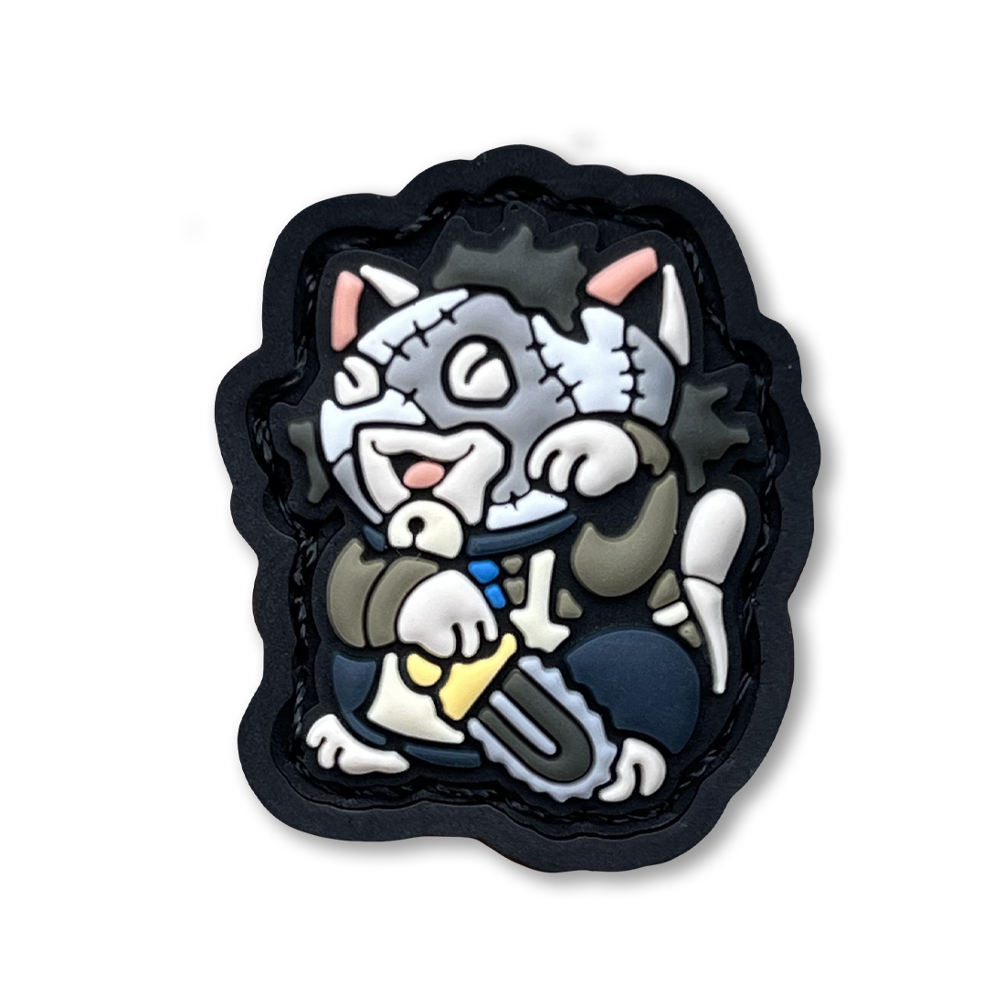 Leatherface Neko RE PVC ranger eye morale patch of a character in a mask holding a chainsaw sitting in a lucky cat maneki-neko pose.