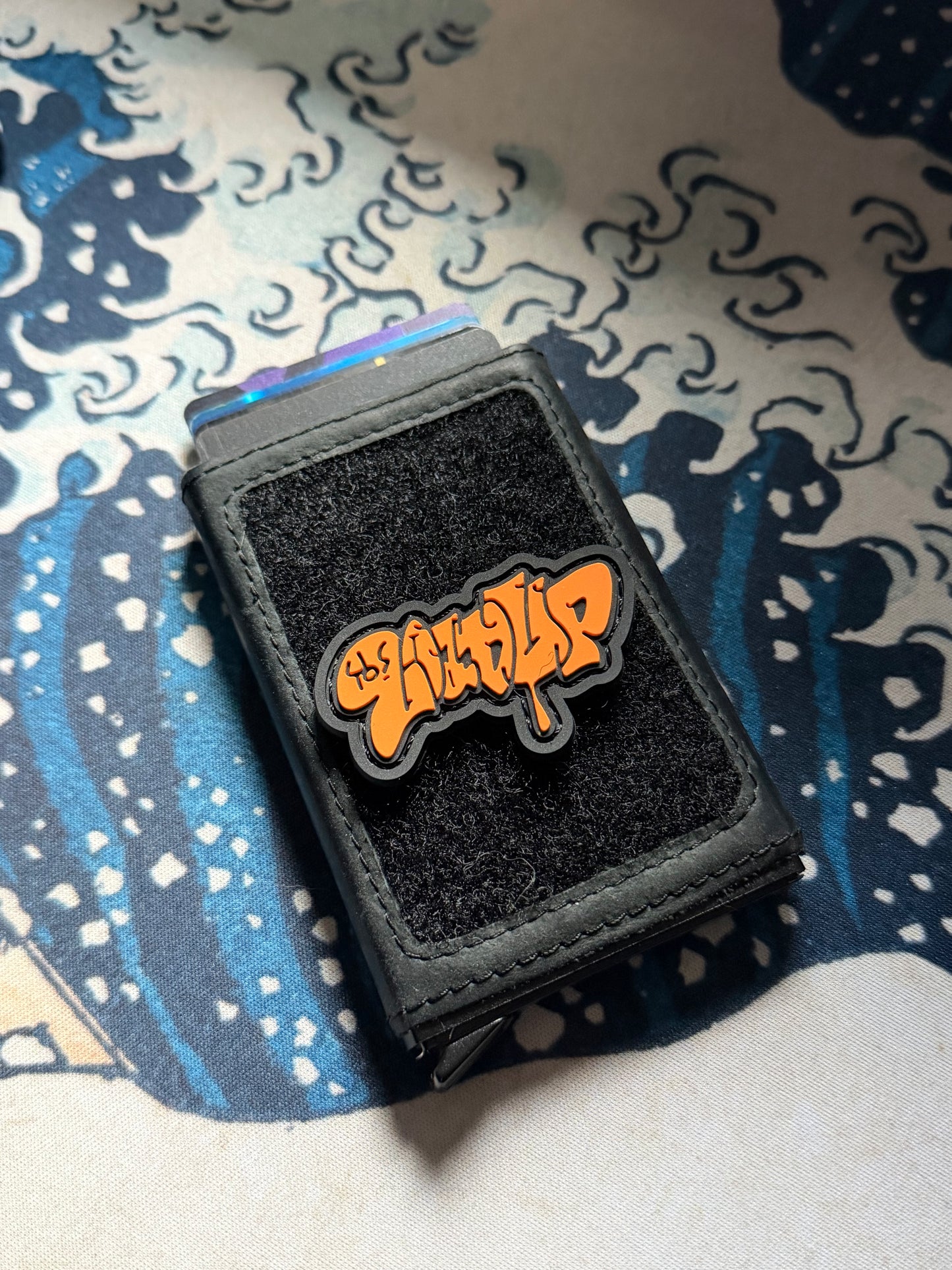 LOADUP Throw Up Orange Re PVC ranger eye morale patch of orange graffiti that says LOAD UP.