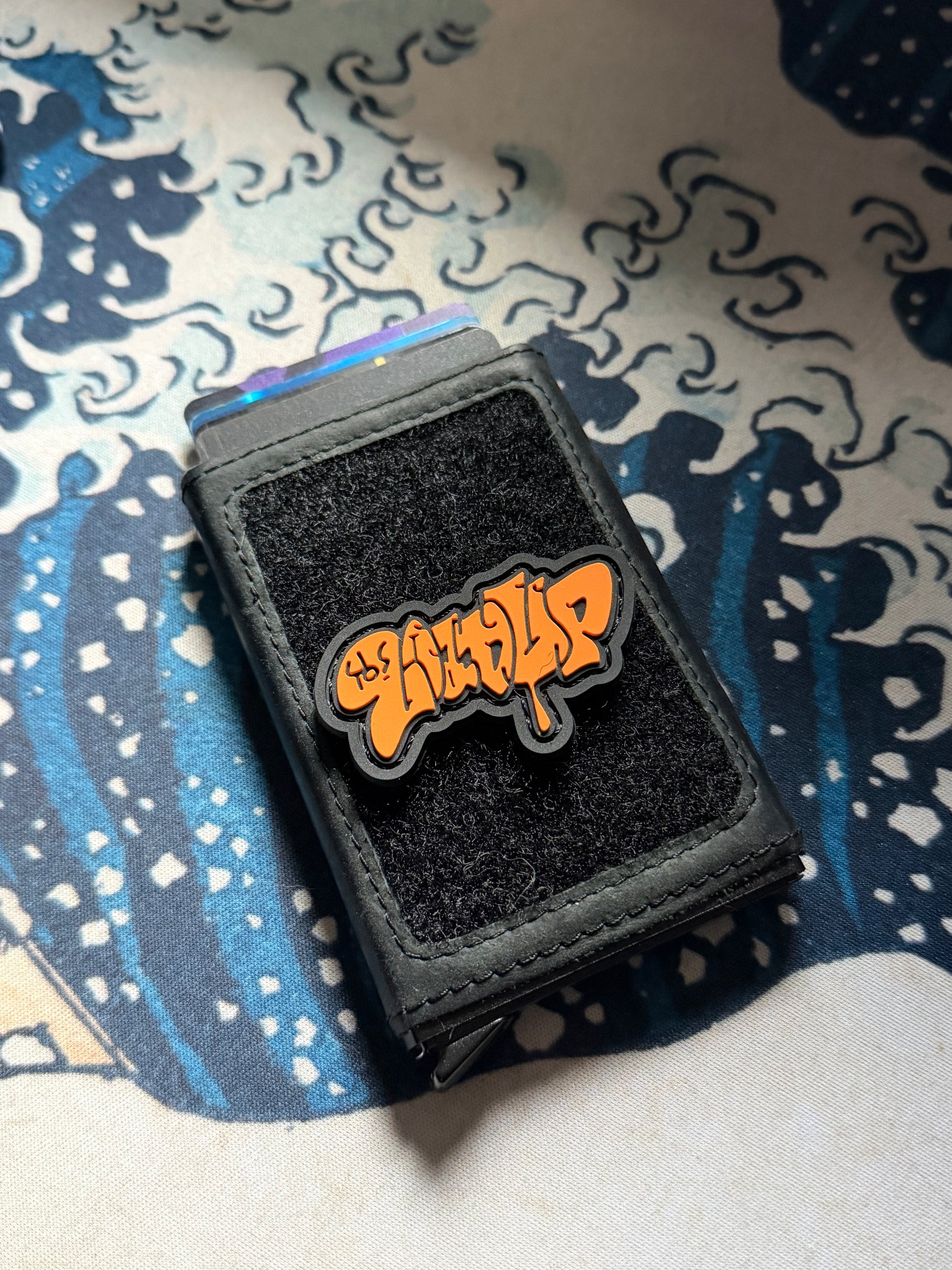 LOADUP Throw Up Orange Re PVC ranger eye morale patch of orange graffiti that says LOAD UP.
