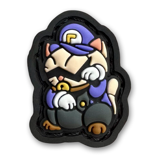 M7Neko RE PVC ranger eye morale patch of a cartoon character with a mustache and purple clothing sitting in a lucky cat maneki-neko pose.