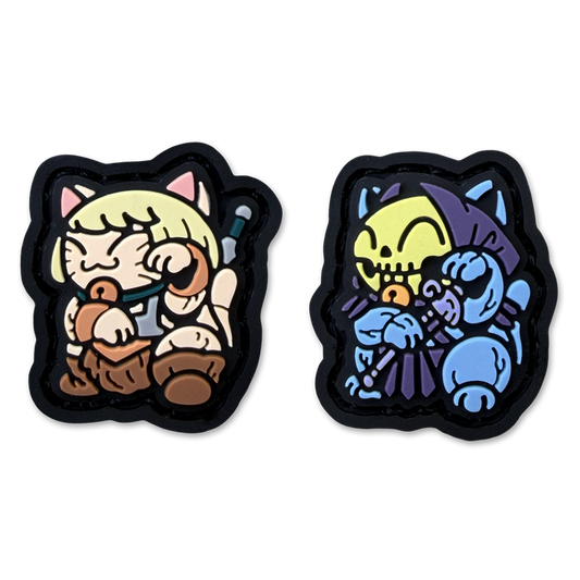 man skeleton neko re patch ranger eye pvc morale patch of two cartoon characters, one man and one blue guy sitting in a lucky cat maneki neko pose