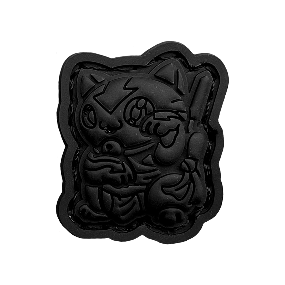 Master of Elements Neko Blackout RE PVC ranger eye patch of a cartoon character in a lucky cat maneki-neko pose.