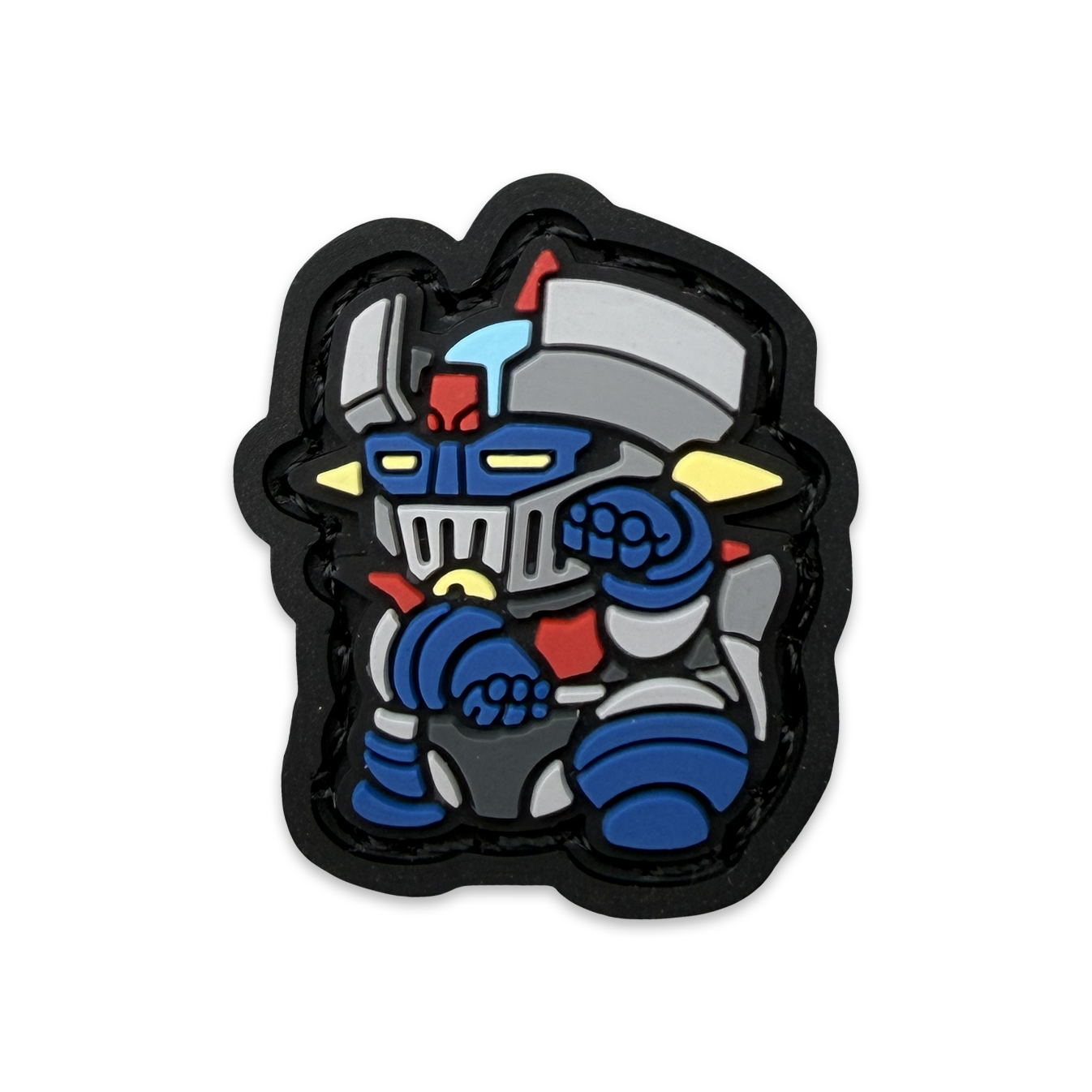 Mazinger Neko RE PVC ranger eye morale patch of a robot in a lucky cat maneki neko pose.