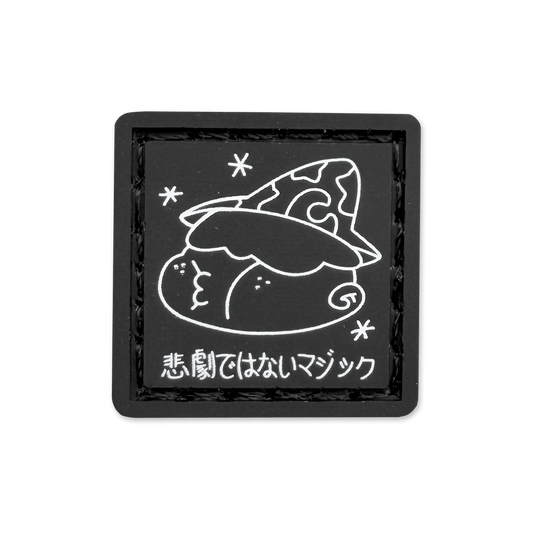 Black square patch with white graphic and text on a white background