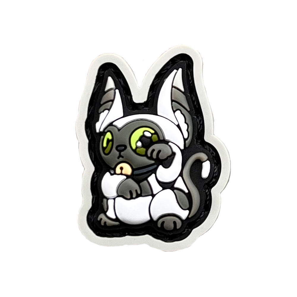 Momo Neko RE PVC ranger eye morale patch of a white lemur cartoon character sitting in a lucky cat maneki-neko pose.