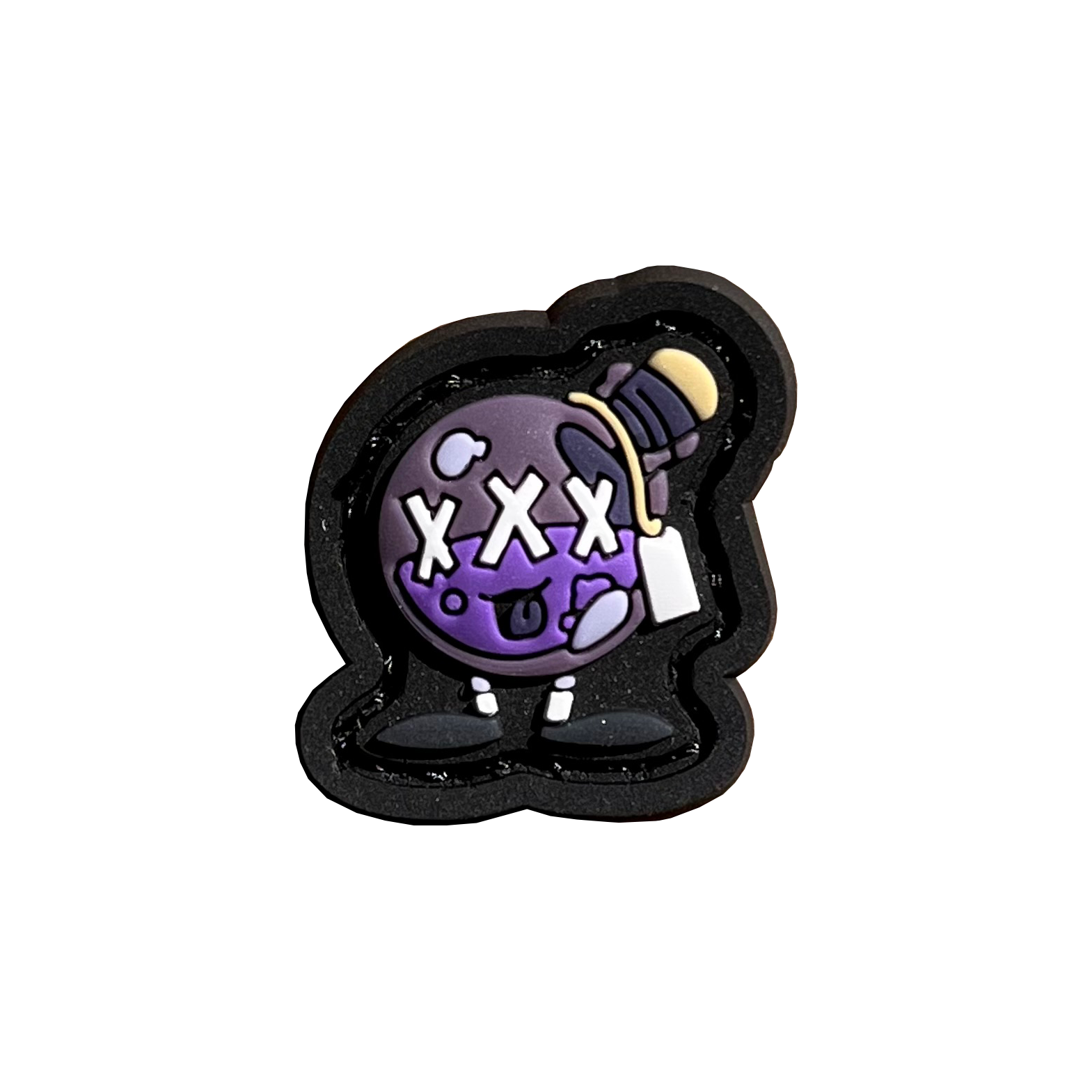 A round purple bottle with 3 'Xs' on the front and a smiley mouth.