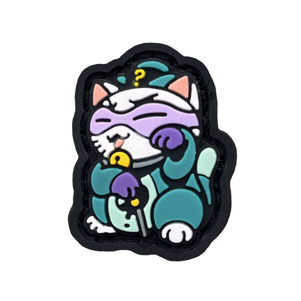 Riddler Neko RE PVC ranger eye neko patch of a character in a purple mask and green outfit sitting in a lucky cat maneki-neko pose.