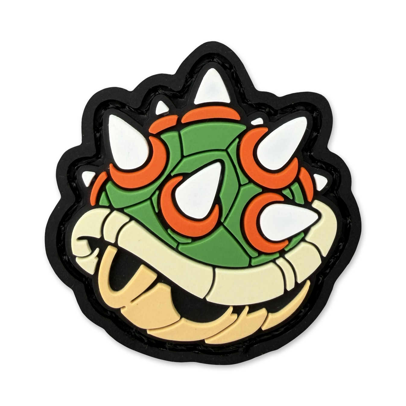 Ranger eye pvc morale patch of a green and orange turtle shell with spikes