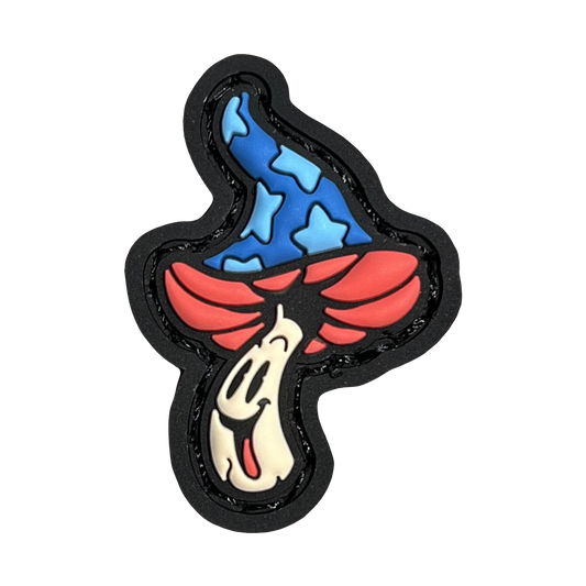a red, blue, and peach smiling mushroom whose cap is reminiscent of mickey sorcerer fantasia 