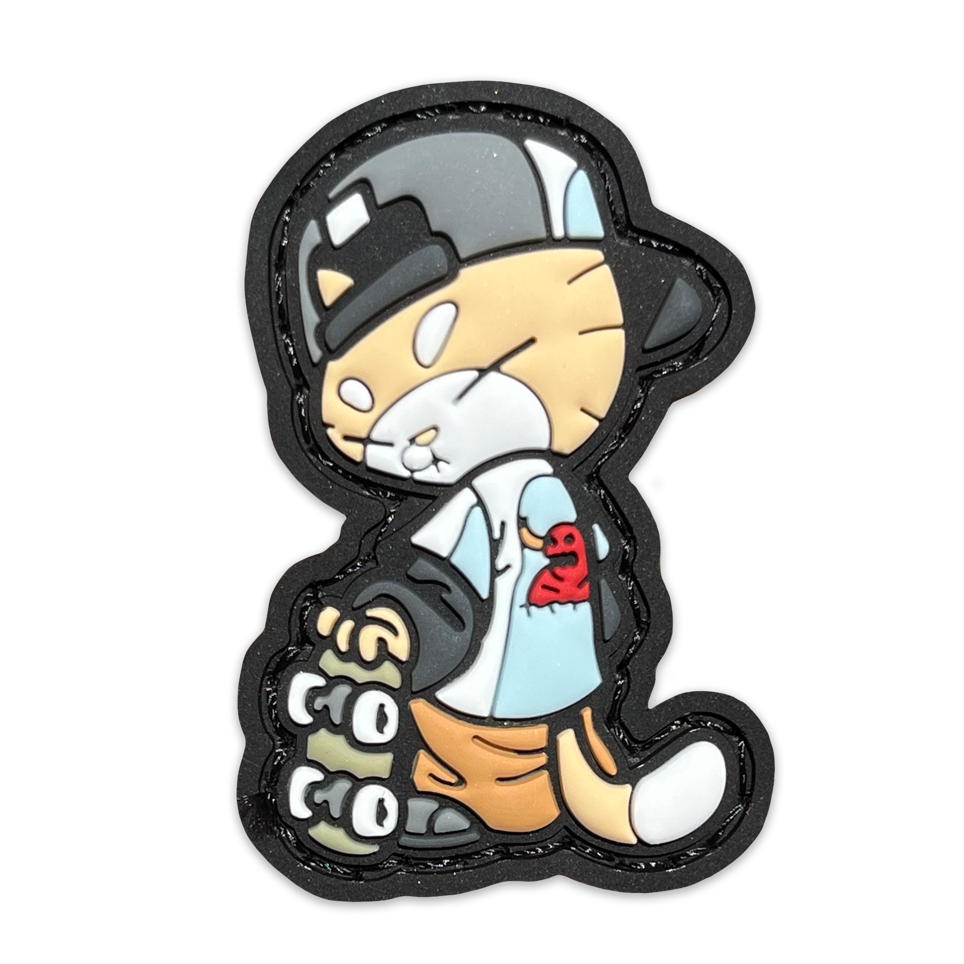 Skate Cato RE PVC ranger eye morale patch of an orange cat wearing a backwards hat and Toy Machine shirt holding a skateboard 