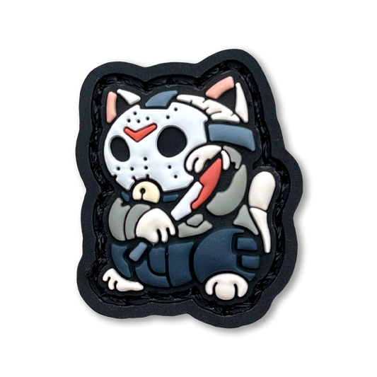 Slasher Neko RE PVC ranger eye morale patch of a character wearing a hockey mask and wielding a knife sitting in a lucky cat maneki-neko pose.