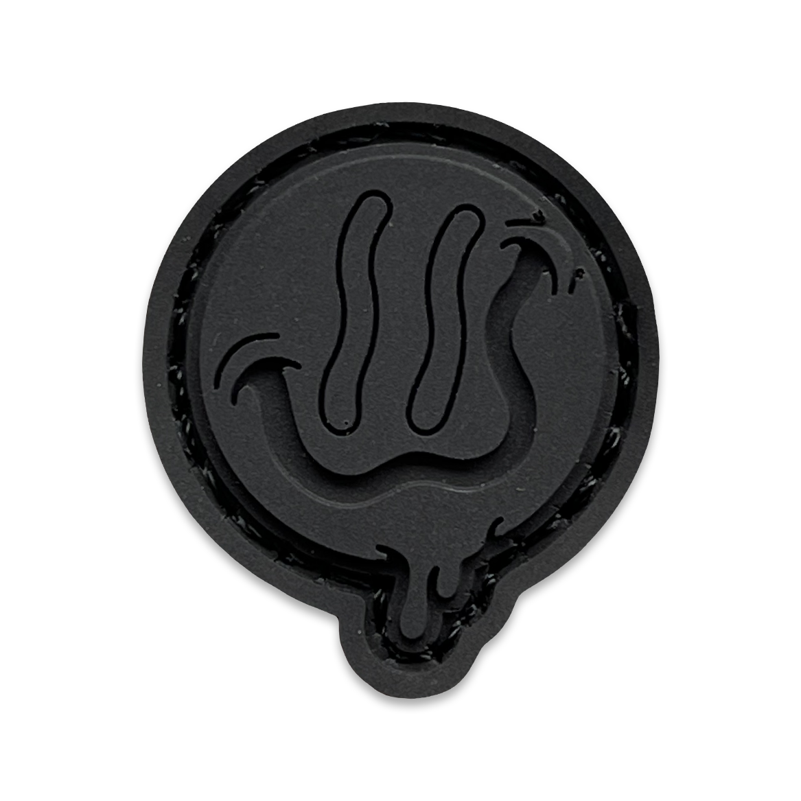 Smile Blackout RE PVC patch of a face with a curvy smile.