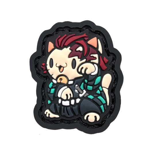a small patch depicting tanjiro of demon slayer in a lucky cat (neko) pose for good fortune.