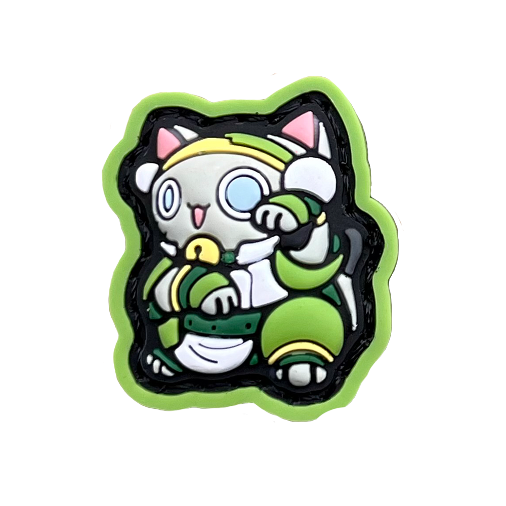 Toph Neko RE PVC ranger eye patch of a cartoon character wearing green clothes sitting in a lucky cat maneki-neko pose.