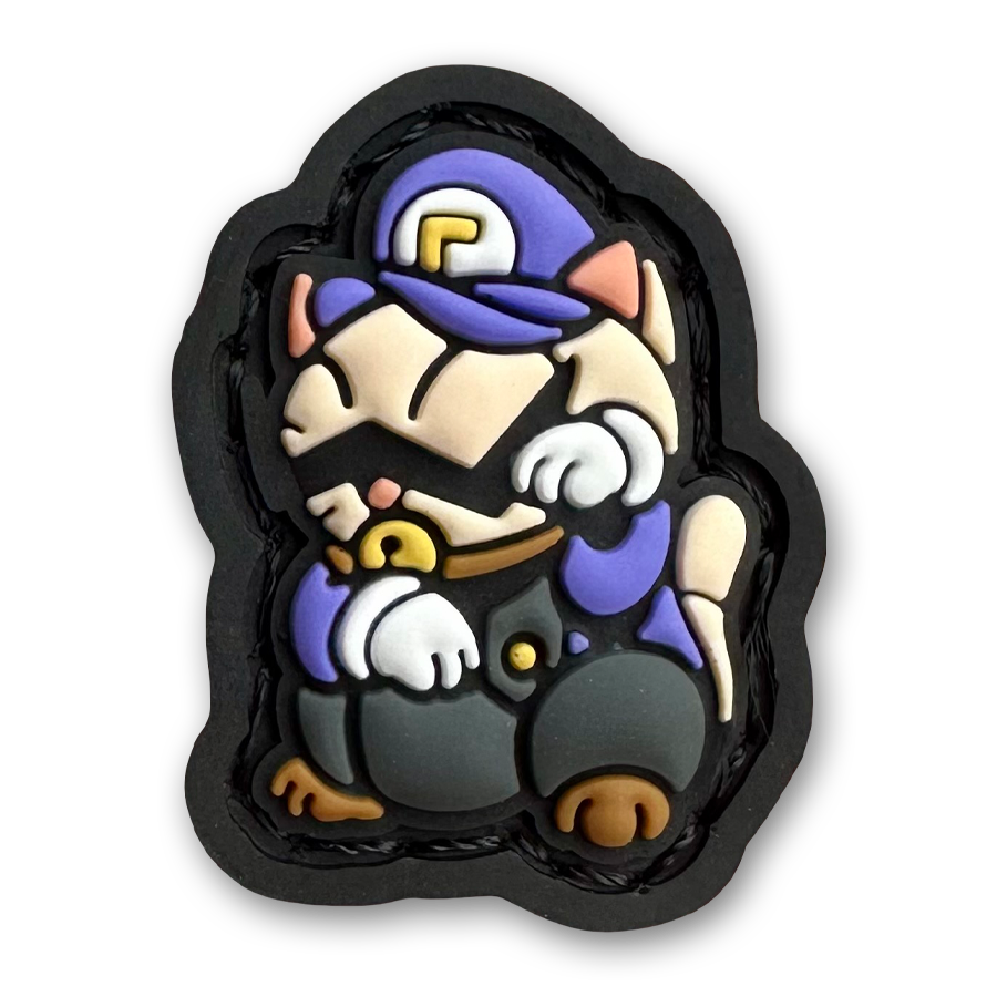 Waluigi Neko RE PVC ranger eye morale patch of a cartoon character with a mustache and purple clothing sitting in a lucky cat maneki-neko pose.