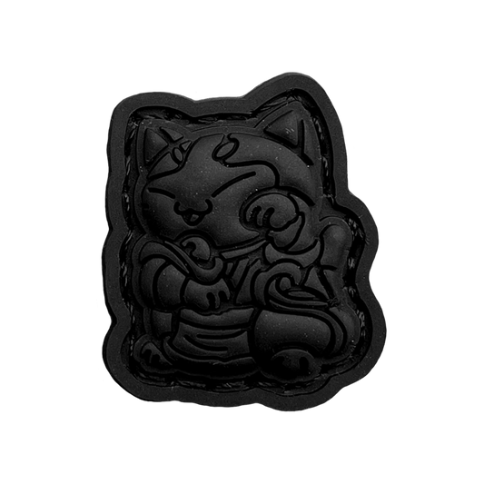 Water Bender Neko Blackout RE of a cartoon character sitting in a lucky cat maneki-neko pose.