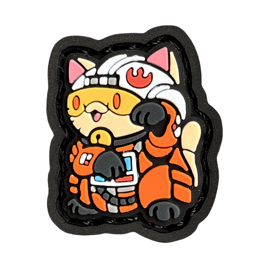 X-Wing Pilot Neko RE 2D PVC ranger eye morale patch of a cartoon character wearing a white helmet with orange clothes standing in a lucky cat maneko pose.