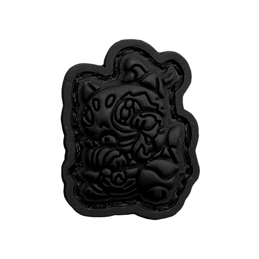 Zuko Neko Blackout RE PVC ranger eye morale patch of a cartoon character fully blacked out in a lucky cat maneko pose.